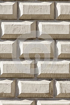 Stone wall as a background. White texture.