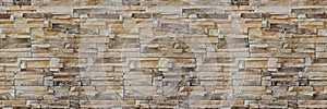 Stone wall brick texture. Seamless pattern. Background of the Sandstone facade.