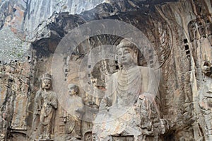 Stone Wall Carved Statues, Buddhist Longmen Caves, China