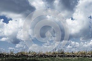 Stone wall in a cloudy day