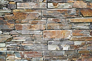 Stone wall composed of stones of various shapes