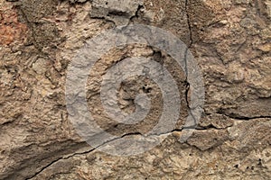 Stone wall with cracks. Texture photo.