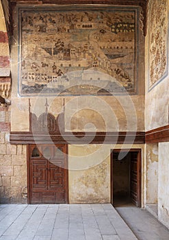 Stone wall decorated with mural depicting Istanbul city at ottoman historic Waseela Hanem House, Old Cairo, Egypt photo