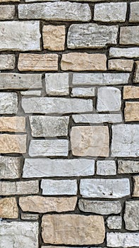 Stone wall of different colors and dimensions