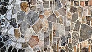 Stone wall of different colors and dimensions