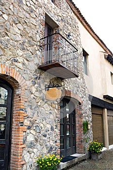 Stone wall facade and a alley