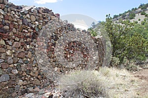 Stone wall of fallen mercantile building