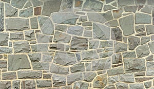 Stone wall fieldstone grey rock background