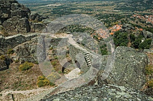 Stone wall with gateway and landscape at the Castle of Monsanto