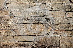 stone wall of grey dirty broken slate background. rocky background