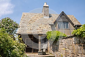 Stone wall leading to side entrance of former estate in Topsmead State Forest