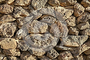 Stone wall made of volcanic rocks