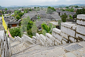 Stone wall with parapets around ancient town,Qingyan town