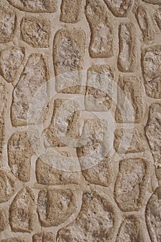 Stone wall pattern as texture and background for design. Close up view of old wall texture.