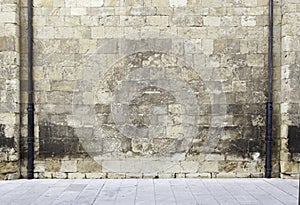 Stone wall with pipes