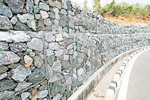 Stone wall - for protect rock fall down and erosion from hill.