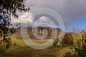 Stone wall of the Puka Pukara Archaeological Complex in Cusco, Peru