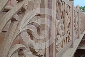 Stone wall railing design, stone jaali stock photo