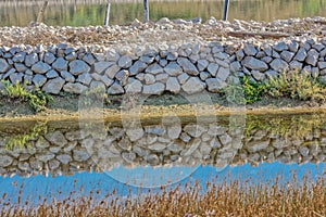 Stone Wall Reflection at Solana Pag Salt Pans