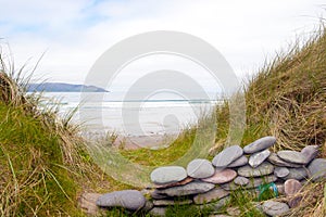 Stone wall shelter on a beautiful Irish beach