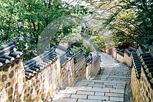 Stone wall street and green trees at Beomeosa temple in Busan, Korea