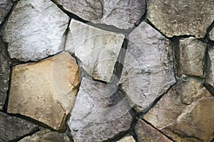 Stone wall surface can use as background pattern or texture