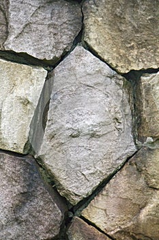 Stone wall surface can use as background pattern or texture