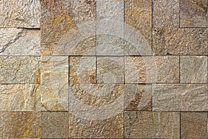 Stone wall texture, travertine tiles facing photo