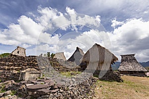 Stone wall and traditional houses