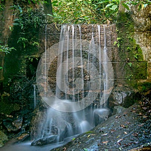 Stone wall waterfall long exposure