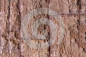 Stone wall weathered hard light brown background solid base