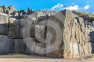 Stone walls of the fortress Saqsaywaman in Cusco, Peru photo