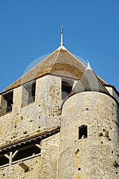 Stone walls and towers of a medieval castle in the town of Provins