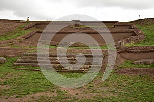 Stone walls uncovered by archaeologists at the Puma Punku, a UNESCO world heritage site. Tiwanaku, Bolivia