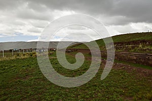 Stone walls uncovered by archaeologists at the Puma Punku, a UNESCO world heritage site. Tiwanaku, Bolivia