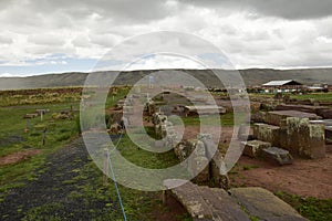 Stone walls uncovered by archaeologists at the Puma Punku, a UNESCO world heritage site. Tiwanaku, Bolivia