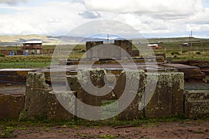 Stone walls uncovered by archaeologists at the Puma Punku, a UNESCO world heritage site. Tiwanaku, Bolivia