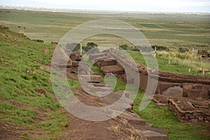 Stone walls uncovered by archaeologists at the Puma Punku, a UNESCO world heritage site. Tiwanaku, Bolivia