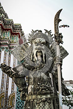 Stone Warrior at Wat Pho, Phra Nakhon District, Bangkok, Thailand.