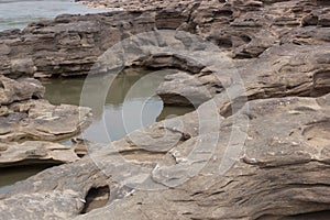 Stone was scoured by the river