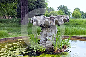 Stone water feature in a large pond