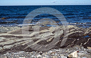 Stone and waves at Baie des Sables photo