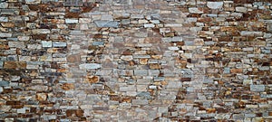 Stone web header old wall vintage texture panoramic large background brick siding different sized stones