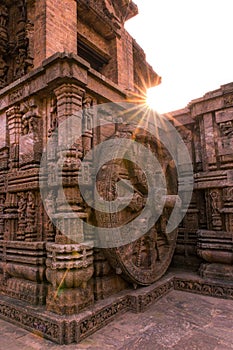 A stone wheel engraved in the walls of the 800 year old Sun Temple, Konark, India.