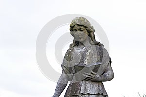 Stone Woman Statue On Saddleworth Moor Pennines In Manchester photo