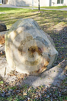 A stone with of word kite on it