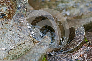 Stone Zen water cascade close up detail