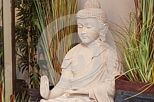 Stoned buddha in gardening store for serenity decorat