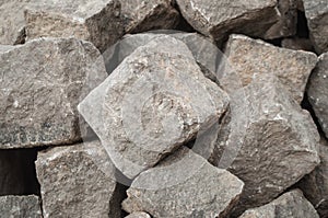 Stoned cobbles for road paving