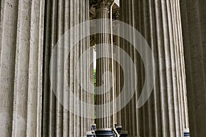 Stoned facade architectural window arches and columns. Medieval castle church exterior. Minimal architecture design and detail